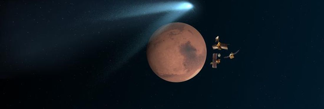Cometa passa raspando por Marte. Na imagem:  Ilustração mostra sondas marcianas da NASA que se alinham atrás do planeta vermelho para protegê-los de poeira do cometa.
