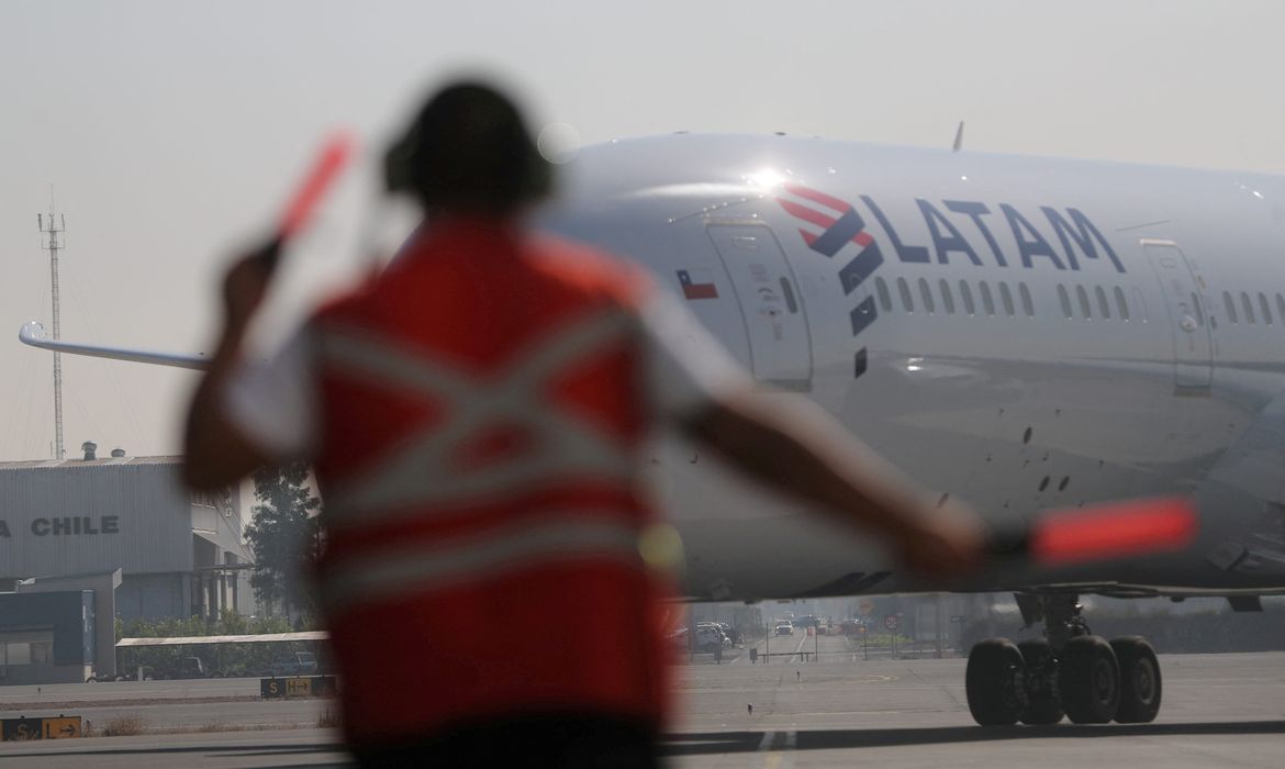 FILE PHOTO: A passenger plane arrives at the Arturo Merino Benitez International Airport in Santiago