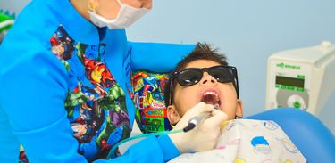 Criança no dentista