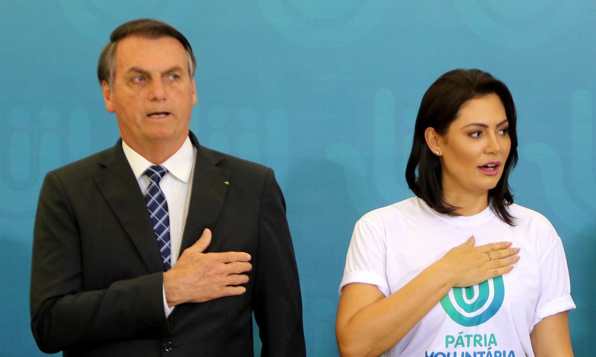 O presidente Jair Bolsonaro e a primeira-dama Michelle Bolsonaro, participam da cerimônia de comemoração ao Dia Internacional do Voluntariado