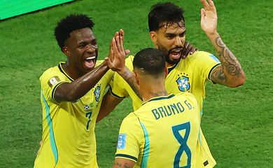 Soccer Football - FIFA World Cup 2026 - Group C - Scotland v Brazil - Miami Stadium, Miami Gardens, Florida, U.S. - June 24, 2026 Brazil's Vinicius Junior celebrates scoring their second goal with Lucas Paqueta and Bruno Guimaraes REUTERS/Marco Bello