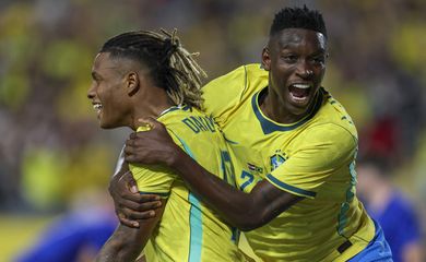 Mar 31, 2026; Orlando, Florida, USA; Brazil midfielder Danilo (18) reacts with forward Luiz Henrique (20) after scoring a goal against Croatia in the first half during an international friendly at Camping World Stadium. Mandatory Credit: Nathan Ray Seebeck-Imagn Images