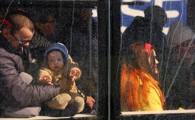 Refugees from the ongoing Russian invasion at a train station in Lviv