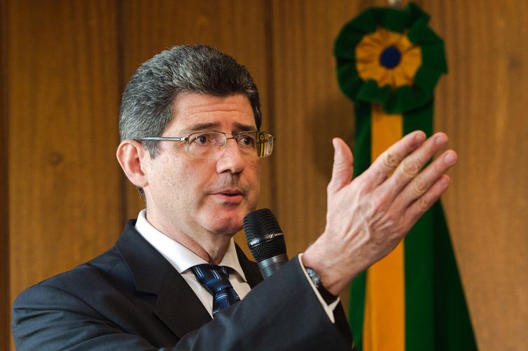 Brasília - O ex-ministro Joaquim Levy transmite o cargo para o novo ministro da Fazenda, Nelson Barbosa (Marcelo Camargo/Agência Brasil)