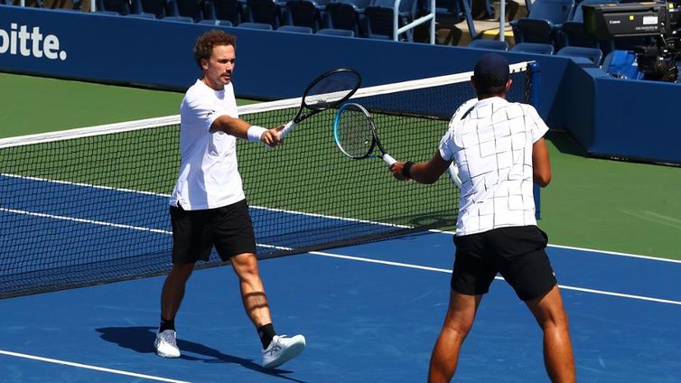 September 5, 2020 - Mate Pavic and Bruno Soares in action against Jack Sock and Jackson Withrow during a men's doubles match at the 2020 US Open. (Photo by Adam Glanzman/USTA)