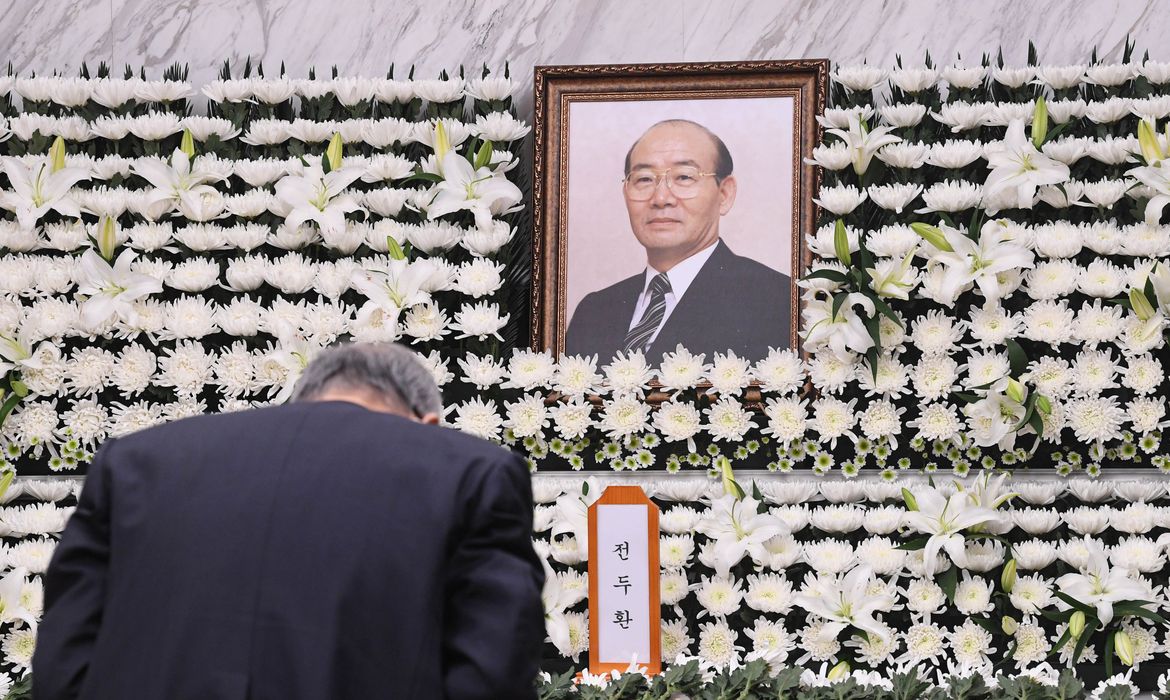 A man mourns during a funeral for late former South Korean President Chun Doo-hwan, who took office following a 1979 military coup, in Seoul