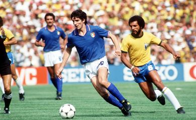 FILE PHOTO: Italy's Paolo Rossi gets away from Brazil's Junior