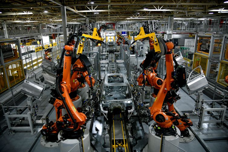 Autonomous robots assemble an X model SUV at the BMW manufacturing facility in Greer, South Carolina, U.S. November 4, 2019. REUTERS/Charles Mostoller