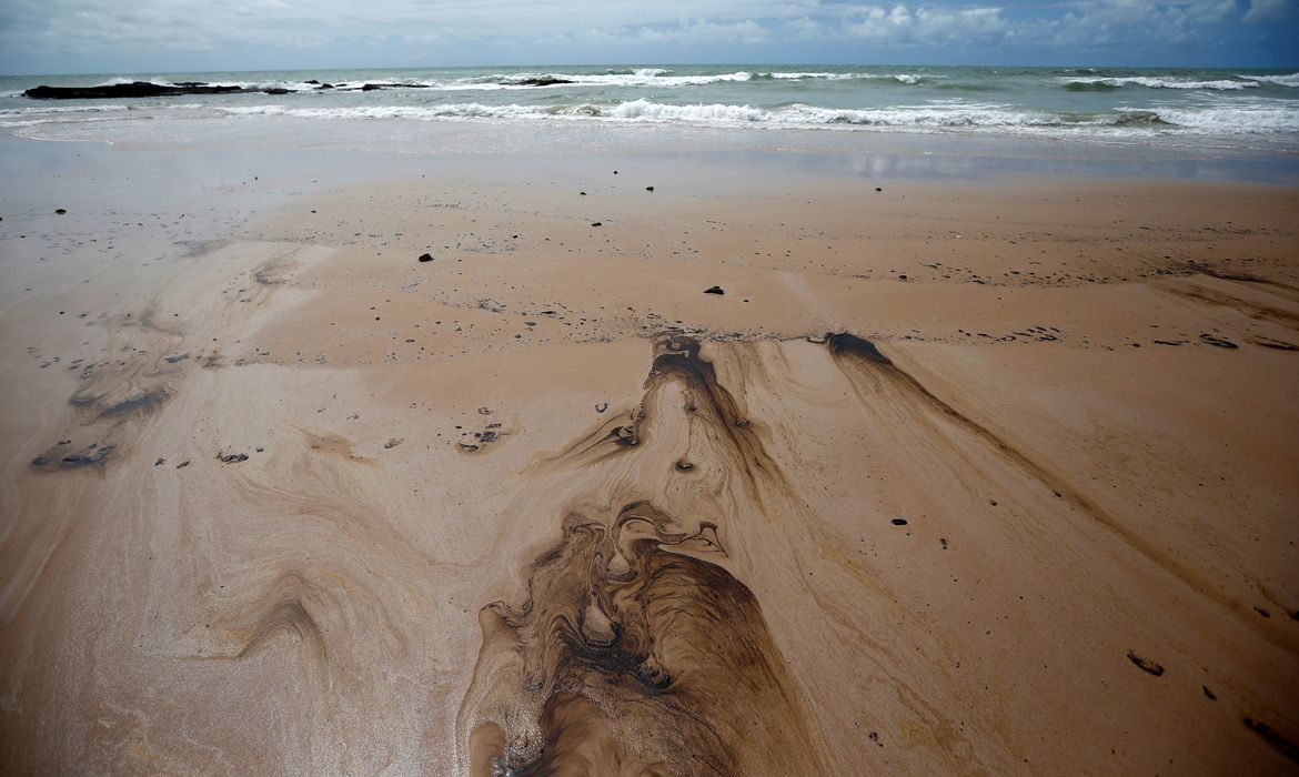 Oil spil is seen on Coruripe beach, Alagoas state