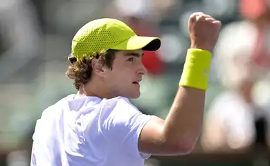 Mar 6, 2025; Indian Wells, CA, USA;  Joao Fonseca (BRA) reacts shot during his first round match as he defeated Jacob Fearnley (not pictured) in the BNP Paribas Open at the Indian Well Tennis Garden. Mandatory Credit: Jayne Kamin-Oncea-Imagn Images