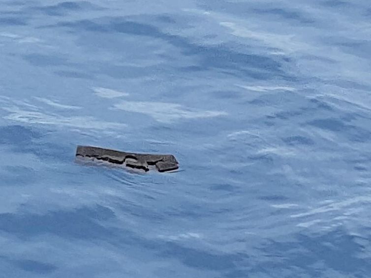 Debris believed by the Chilean Air Force to be from a Hercules C-130 military cargo plane that crashed this week and went missing, is seen in the Drake Passage or Sea of Hoces, Mid-Sea in this undated handout received on December 11, 2019.