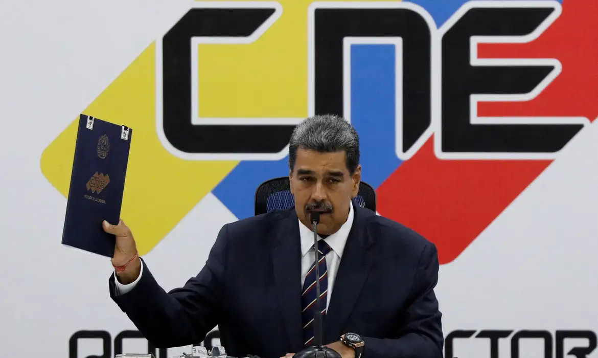 Venezuela's President Nicolas Maduro speaks at the National Electoral Council (CNE) after its announcement that he won the country's presidential election, in Caracas, Venezuela July 29, 2024. REUTERS/Leonardo Fernandez Viloria TPX IMAGES OF THE DAY