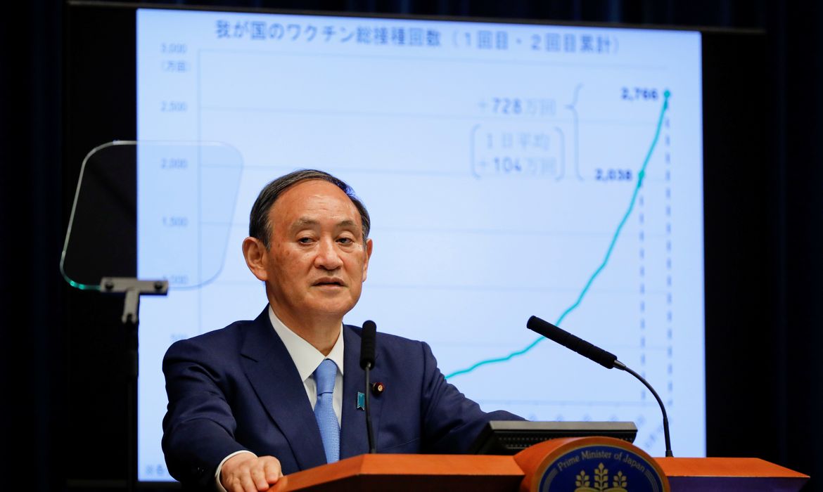 Japanese Prime Minister Yoshihide Suga attends a news conference on Japan's response to the COVID-19 outbreak, in Tokyo