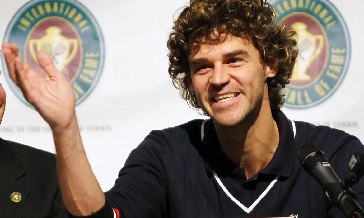 Tennis Hall of Fame inductee Kuerten of Brazil answers a question during a news conference at International Tennis Hall of Fame in Newport