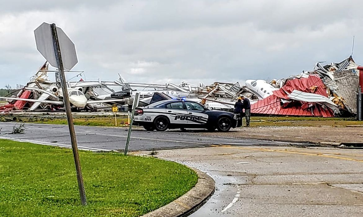 Social media images of damaged planes and buildings in the aftermath of a tornado in Monroe, Louisiana