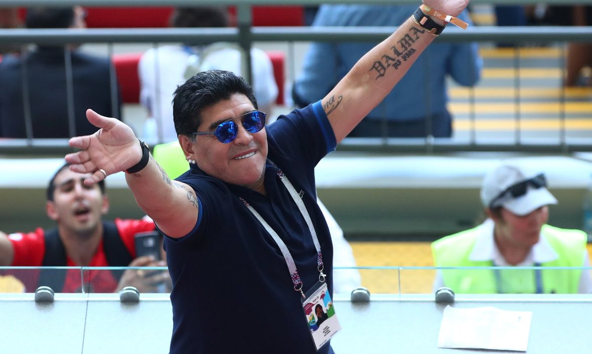 Soccer Football - World Cup - Round of 16 - France vs Argentina - Kazan Arena, Kazan, Russia - June 30, 2018  Diego Maradona gestures while in the stands at half time  REUTERS/Pilar Olivares