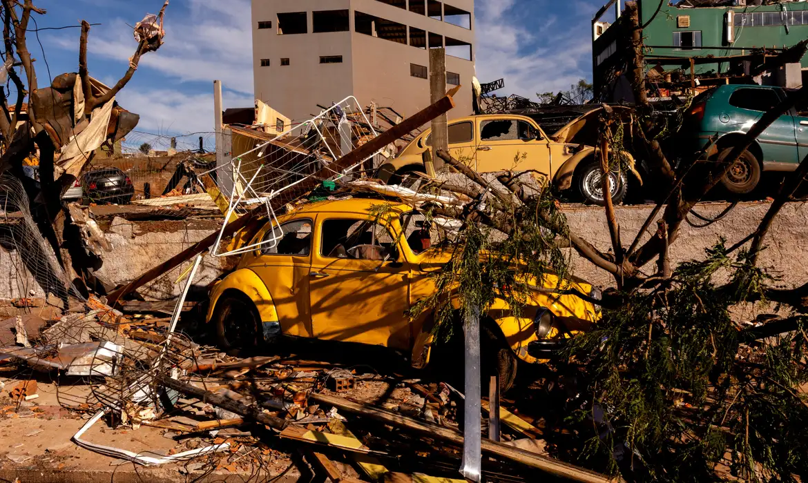 Debris lies on a vehicle at a damaged area after the tornado that hit Rio Bonito do Iguacu, in southern Parana state, Brazil November 9, 2025. REUTERS/Priscila Ribeiro
