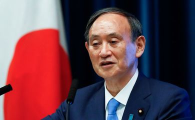 Japan's Prime Minister Yoshihide Suga attends a news conference on Japan's response to the coronavirus disease (COVID-19) outbreak, in Tokyo
