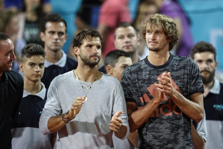 Bulgaria's Grigor Dimitov and Germany's Alexander Zverev are seen during the trophy ceremony during Adria Tour at Novak Tennis Centre in Belgrade