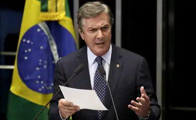 FILE PHOTO: Brazilian Senator Fernando Collor de Mello, a former president, speaks during a session of the Brazilian Federal Senate in Brasilia July 14, 2015. . REUTERS/Ueslei Marcelino/File Photo