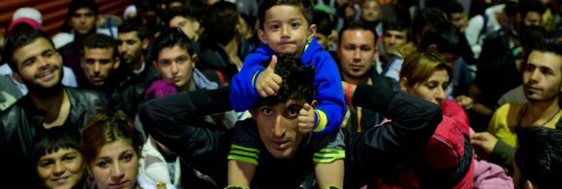 Refugiados Refugiados que atravessaram a Hungria e a Áustria chegam à Alemanha, pela estação ferroviária de Munique