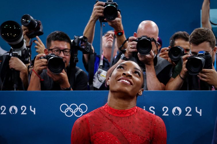 FILE PHOTO: Paris 2024 Olympics - Artistic Gymnastics - Women's Vault Final - Bercy Arena, Paris, France - August 03, 2024. Simone Biles of United States reacts after her performance. REUTERS/Hannah Mckay