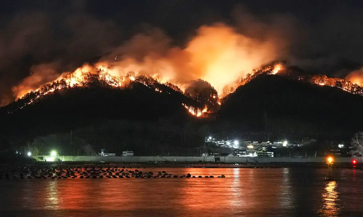 A wildfire continues to rage in a mountainous area in Ofunato, Iwate Prefecture, northeastern Japan, March 3, 2025, in this photo taken by Kyodo. Mandatory credit Kyodo/via REUTERS ATTENTION EDITORS - THIS IMAGE HAS BEEN SUPPLIED BY A THIRD PARTY. MANDATORY CREDIT. JAPAN OUT. NO COMMERCIAL OR EDITORIAL SALES IN JAPAN.
