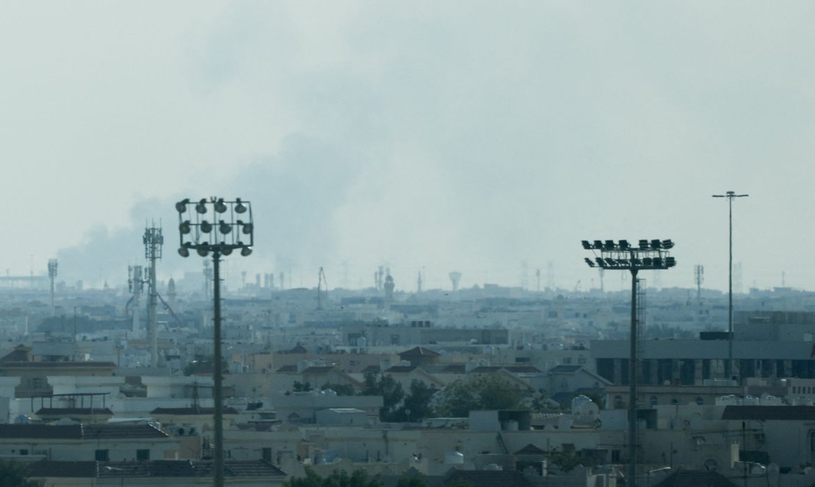 Smoke is left in the sky after reported Iranian missile attacks, following strikes by the United States and Israel against Iran, as seen from Doha, Qatar, February 28, 2026. REUTERS/Mohammed Salem