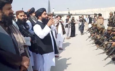 Taliban spokesman Zabihullah Mujahid speaks to Badri 313 military unit at Kabul's airport