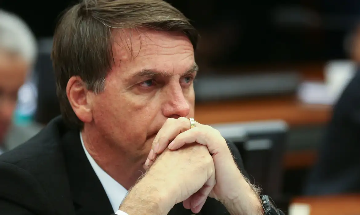 Brasília - Jair Bolsonaro durante o Conselho de Ética da Câmara  que arquivou duas representações contra seu filho, o deputado Eduardo Bolsonaro, por quebra do decoro (Fabio Rodrigues Pozzebom/ Agencia Brasil)